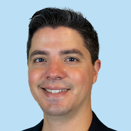 Ricardo_Santos_headshot_blue_square - Close
